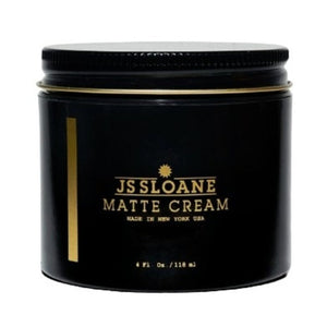 JS Sloane Matte Cream, edestä musta purkki kultaisella etiketillä