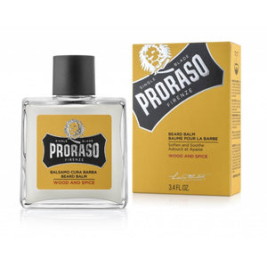 Proraso Beard Balm Wood & Spice, lasipullo keltaisen pakkausrasian vieressä