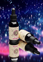 By Elementum Mollis Astrum Beard Oil - twee flesjes tegen sterrenhemel-achtergrond