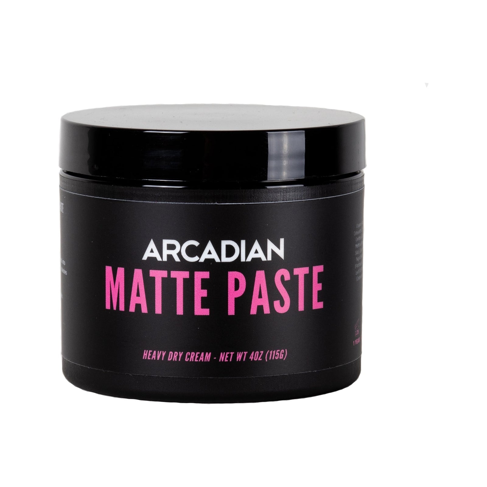 Arcadian Matte Paste, edestä kuvattu musta purkki, jossa on vaaleanpunaiset kirjaimet ja kansi