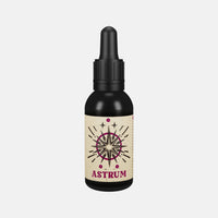 By Elementum Mollis Astrum Beard Oil - vooraanzicht zwart flesje met pipet en sterren-etiket