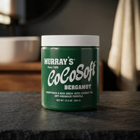 Murrays Cocosoft Bergamot - groene pot op donkere steen in badkamer