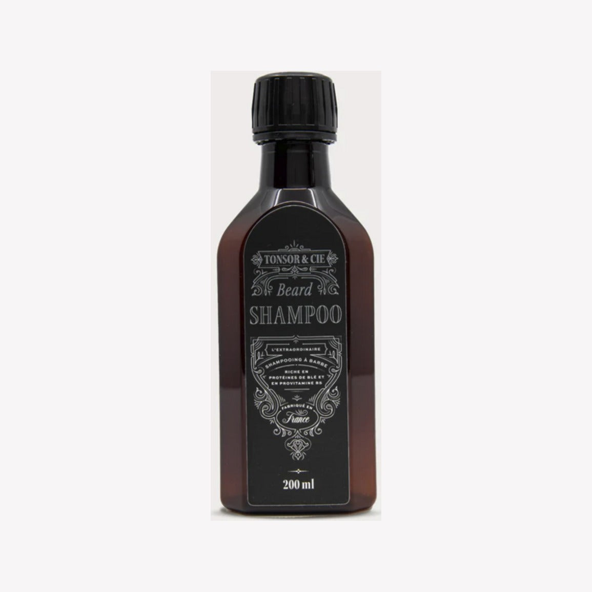 Tonsor & Cie Partashampoo - etukuva meripihkanvärisestä pullosta mustalla etiketillä, 200 ml